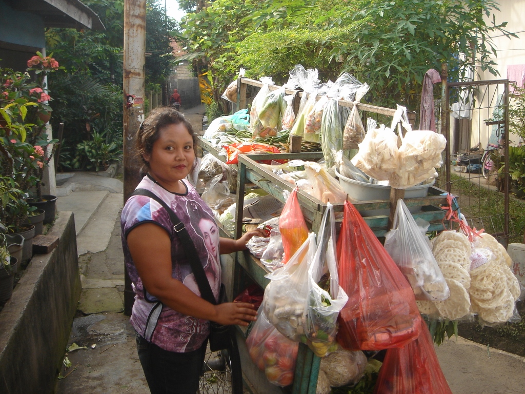 Indonesians living in urban areas can buy food from vendors such as these, but rural households can find it more challenging to find food / John McCarthy mccarthy resized